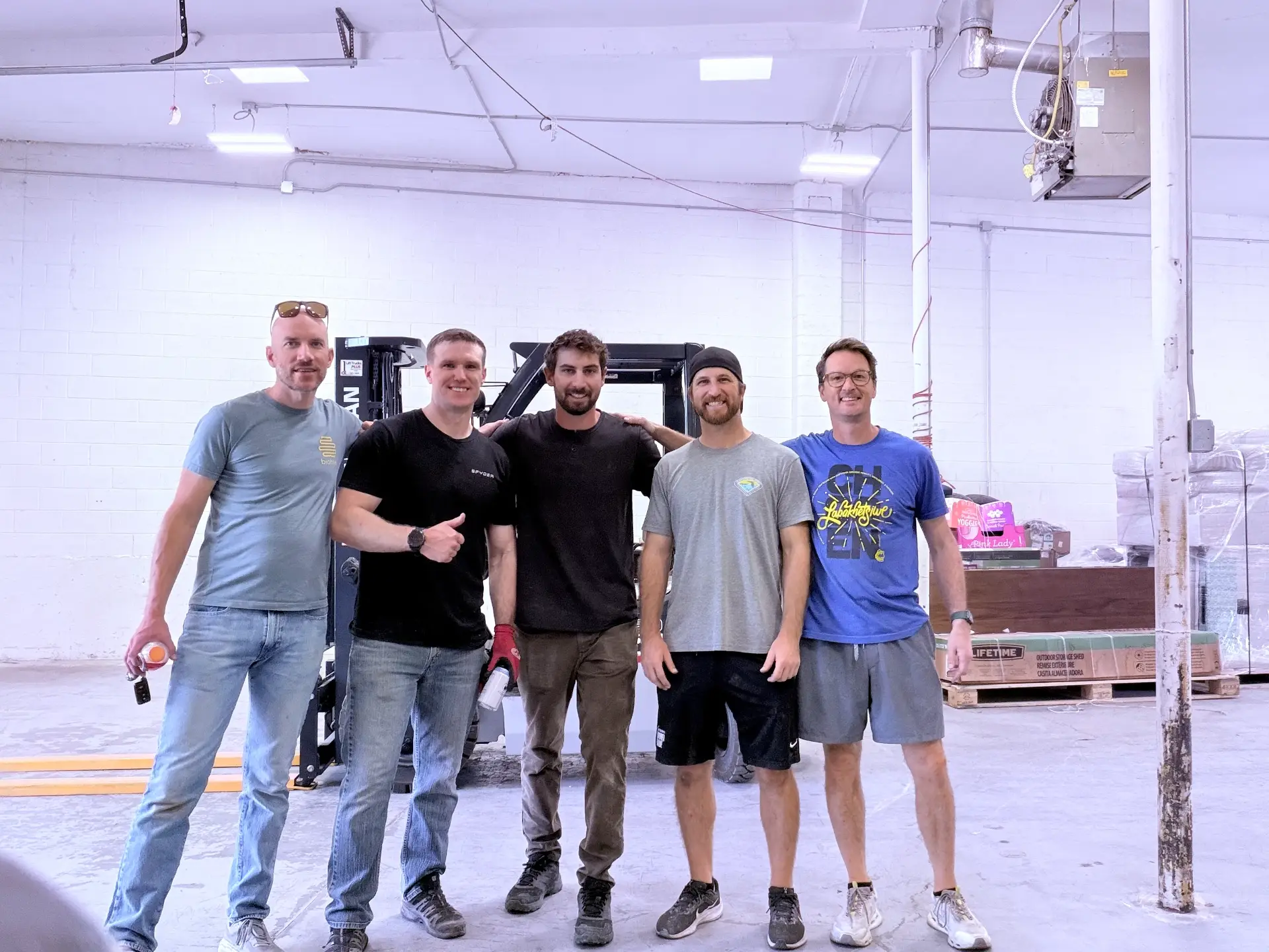 Capital Cares volunteers in the warehouse