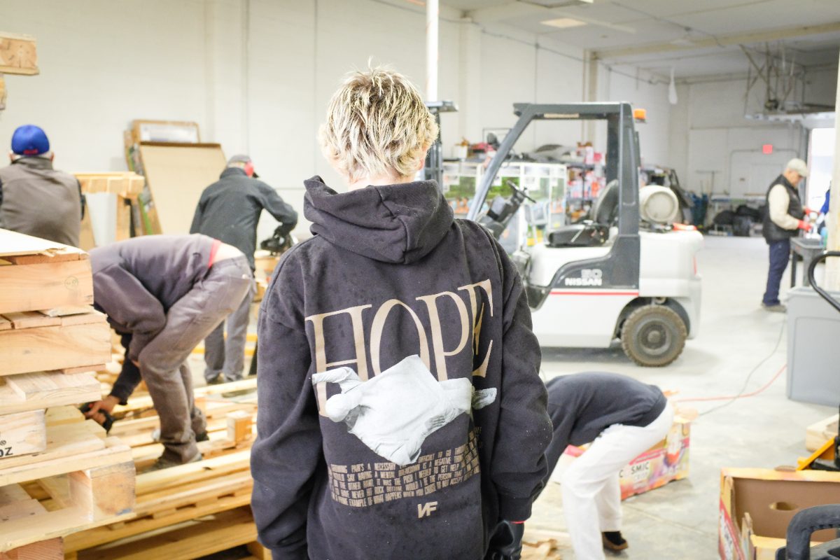 Volunteers at work on the Capital Cares warehouse floor